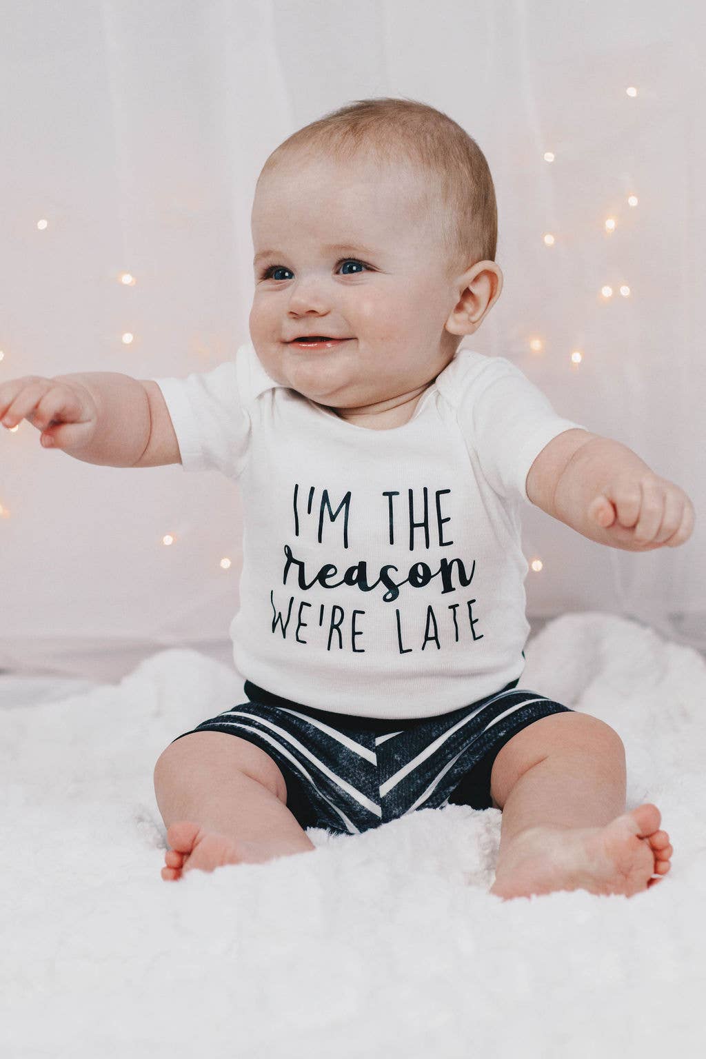 I'm The Reason We're Late Baby Bodysuit