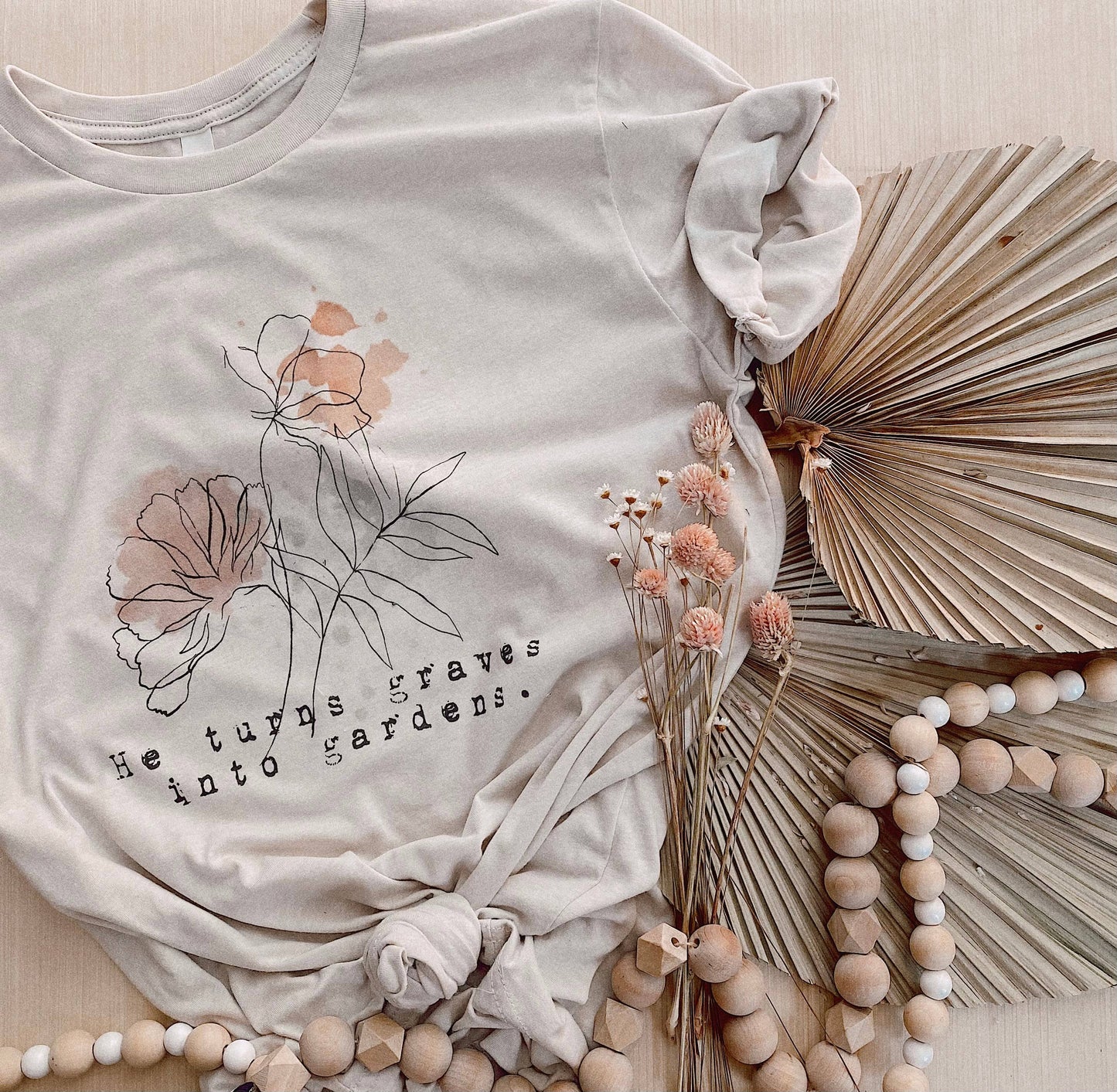 He Turns Graves Into Gardens Graphic Tee